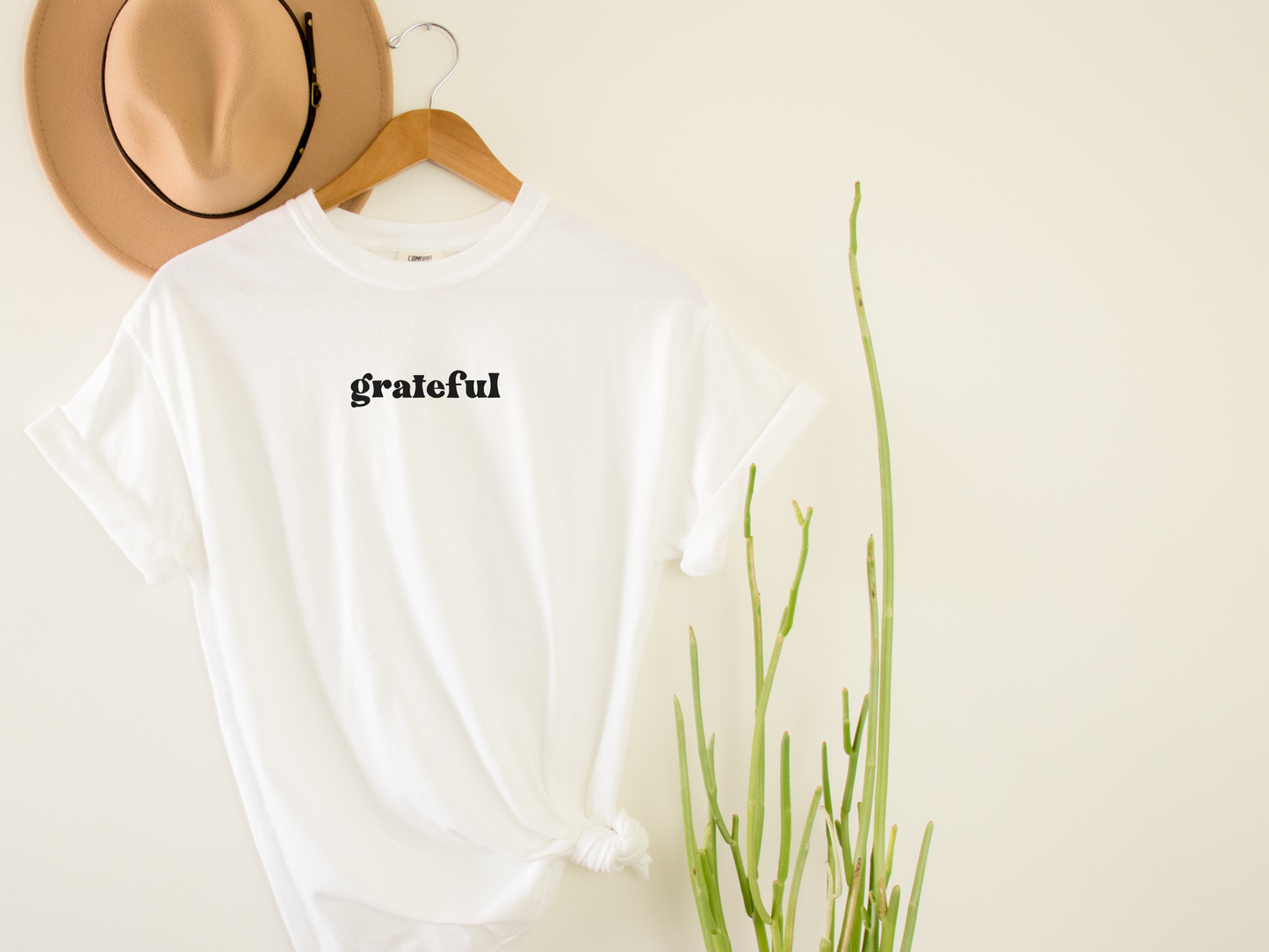 White Short Sleeved Shirt with the word grateful in the center