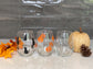 3 halloween wine glass set with black cats, orange pumpkin, and white ghost design on glass, 15oz stemless wine glass, halloween decor, fall aesthetic background