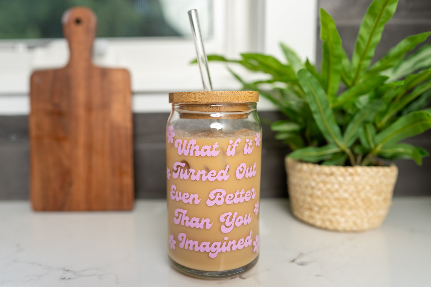 inspirational cup with saying 'what if it turned out even better than you imagined' in a retro font with purple vinyl, 16oz iced coffee glass with bamboo lid and straw
