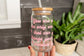 You are the only one that can change your mindset quote on a glass cup with a retro style font in pink with daisy flowers around it, 16oz iced coffee cup with bamboo lid and straw, positive mindset cup